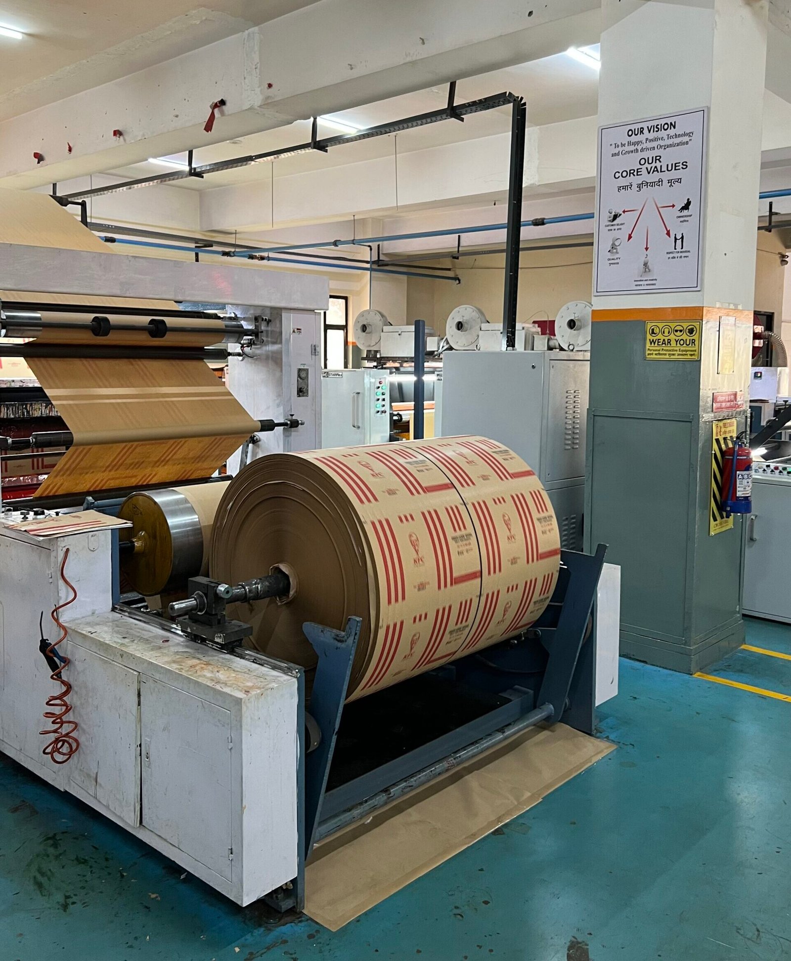 KFC reels on paper bags machine